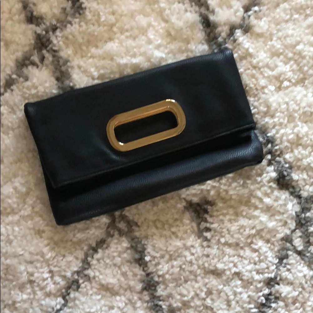 Clutch with strap